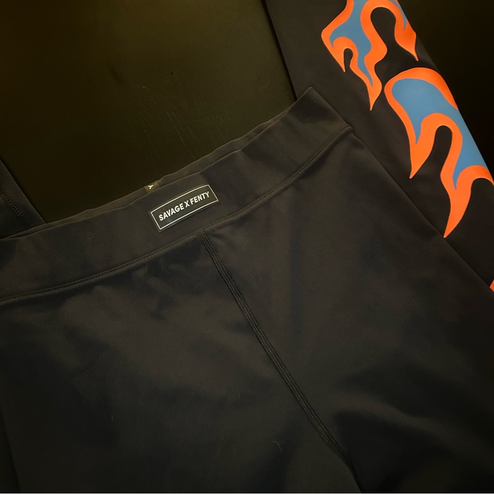 Savage X Fenty Black Leggings with Blue and Orange Flame Accents